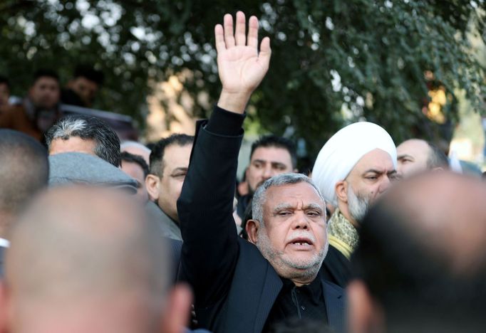 Iraqi militia commander Hadi al-Amiri, a close Iran ally and the top candidate to succeed Muhandis, reacts as he attends the funeral of the Soleimani.