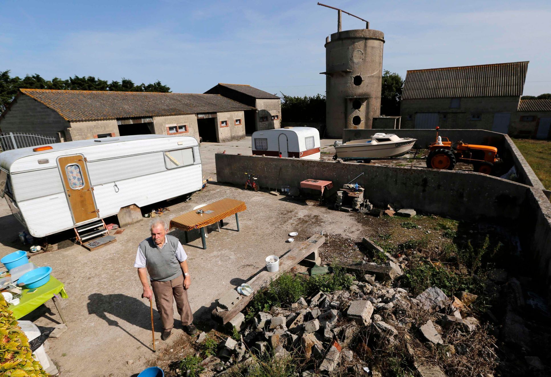Farmer Bertot  poses on his property near the former D-Day landing zone of Utah Beach in Les Dunes de Varreville