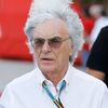Formula One commercial supremo Bernie Ecclestone's hair blows in the wind as he walks at the paddock after the third practice session of the Bahrain F1 Grand Prix at the Bahrain International Circuit