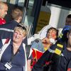 French emergency services transport a victim after a shooting on the Amsterdam to Paris Thalys high-speed train in Arras