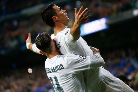 Real Madrid's Cristiano Ronaldo celebrates scoring their third goal and his hat-trick with Sergio Ramos