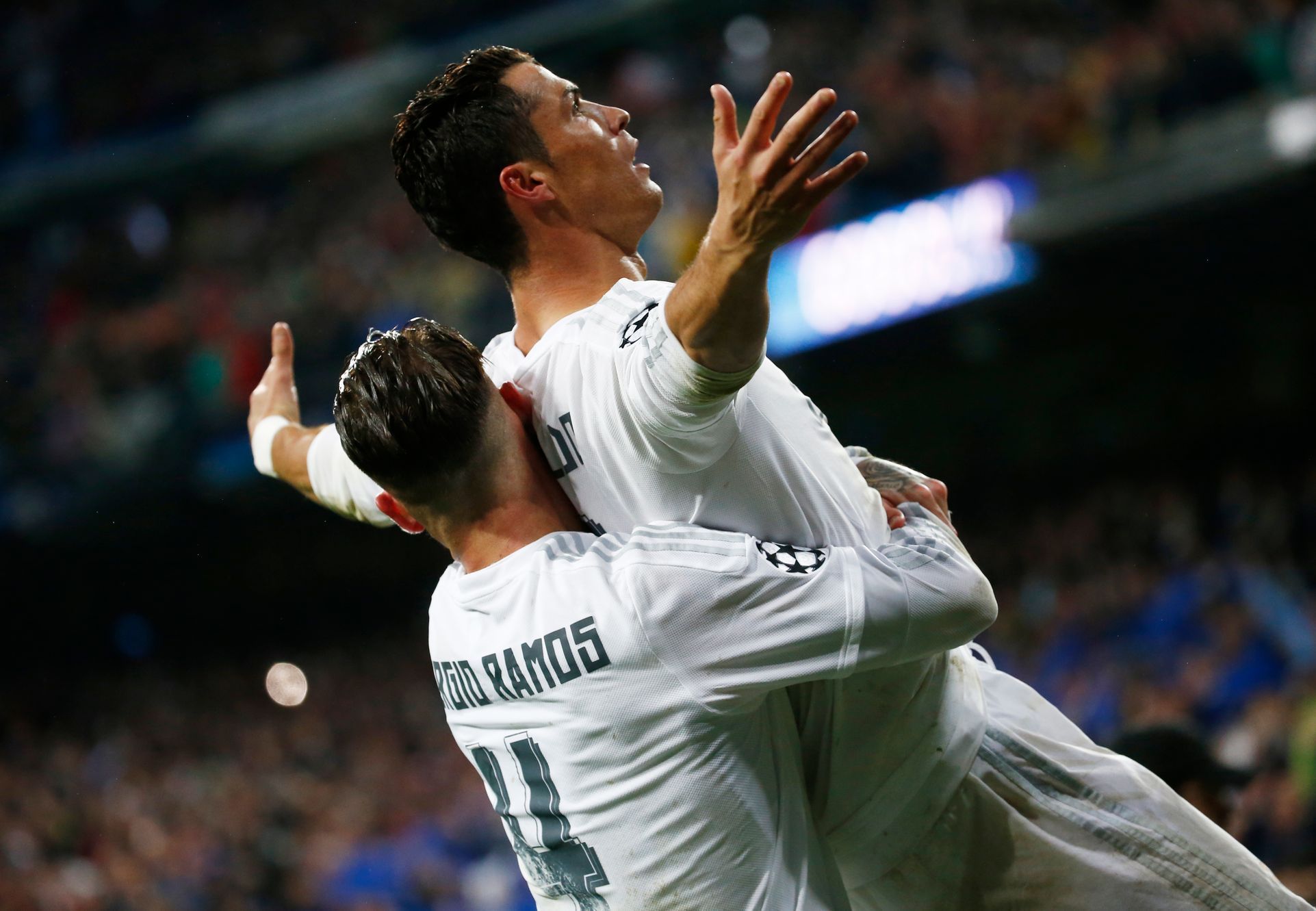Real Madrid's Cristiano Ronaldo celebrates scoring their third goal and his hat-trick with Sergio Ramos