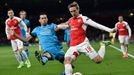 Barcelona's Sergio Busquets in action with Arsenal's Nacho Monreal