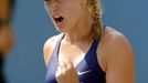 Canada's Eugenie Bouchard celebrates her win Olga Govortsova of Belarus during their match at the 2014 U.S. Open tennis tournament in New York