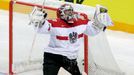 Austria's goaltender Bernhard Strakbaum celebrates after saving a shot at a penalty shootout during their Ice Hockey World Championship game at the O2 arena in Prague, Cz