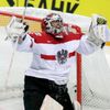 Austria's goaltender Strakbaum celebrates after saving a shot at a penalty shootout during their Ice Hockey World Championship game at the O2 arena in Prague