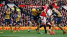 Arsenal's Danny Welbeck scores their first goal