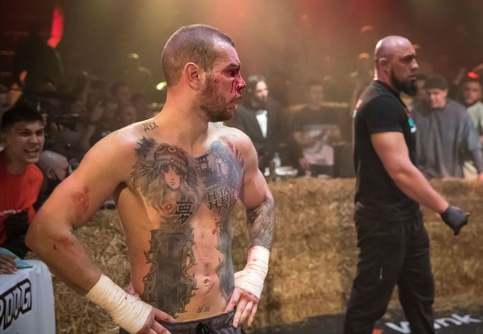 Danik Vesnenok is seen with blood on his face during the "Top Dog" bare-knuckle boxing tournament in Moscow, Russia April 16, 2021. Picture taken April 16, 2021. REUTERS/