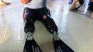 French athlete Philippe Croizon, whose arms and legs were amputated after an electric shock accident in March 1994, waits next to a 33 metre (36 yard) deep pool, the world's deepest pool built to train professional divers, at Nemo33 diving centre in Brussels January 10, 2013. Croizon, who swam with adapted prostheses that had fins attached, broke a world record and became the first disabled person to dive to 33 metres, according to the organisers. REUTERS/Yves Herman (BELGIUM - Tags: SOCIETY SPORT DIVING TPX IMAGES OF THE DAY) Published: Led. 10, 2013, 4:15 odp.