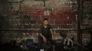 Palestinian Shadi Yassin, 17, poses for a photograph in a car repair garage in Gaza City May 30, 2013. Yassin left school to work as an apprentice in the garage so that he could support his family's income. Apprentice mechanics earn around $100 per month, garage owners saidowners said. REUTERS/Mohammed Salem (GAZA - Tags: TRANSPORT SOCIETY EMPLOYMENT PORTRAIT) Published: Kvě. 30, 2013, 12:55 odp.