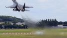 A Sukhoi Su-35 fighter takes off during a flying display, two days before the Paris Air Show, at the Le Bourget airport near Paris, June 15, 2013. The Paris Air Show runs from June 17 to 23. REUTERS/Pascal Rossignol (FRANCE - Tags: BUSINESS AIR TRANSPORT DEFENCE)