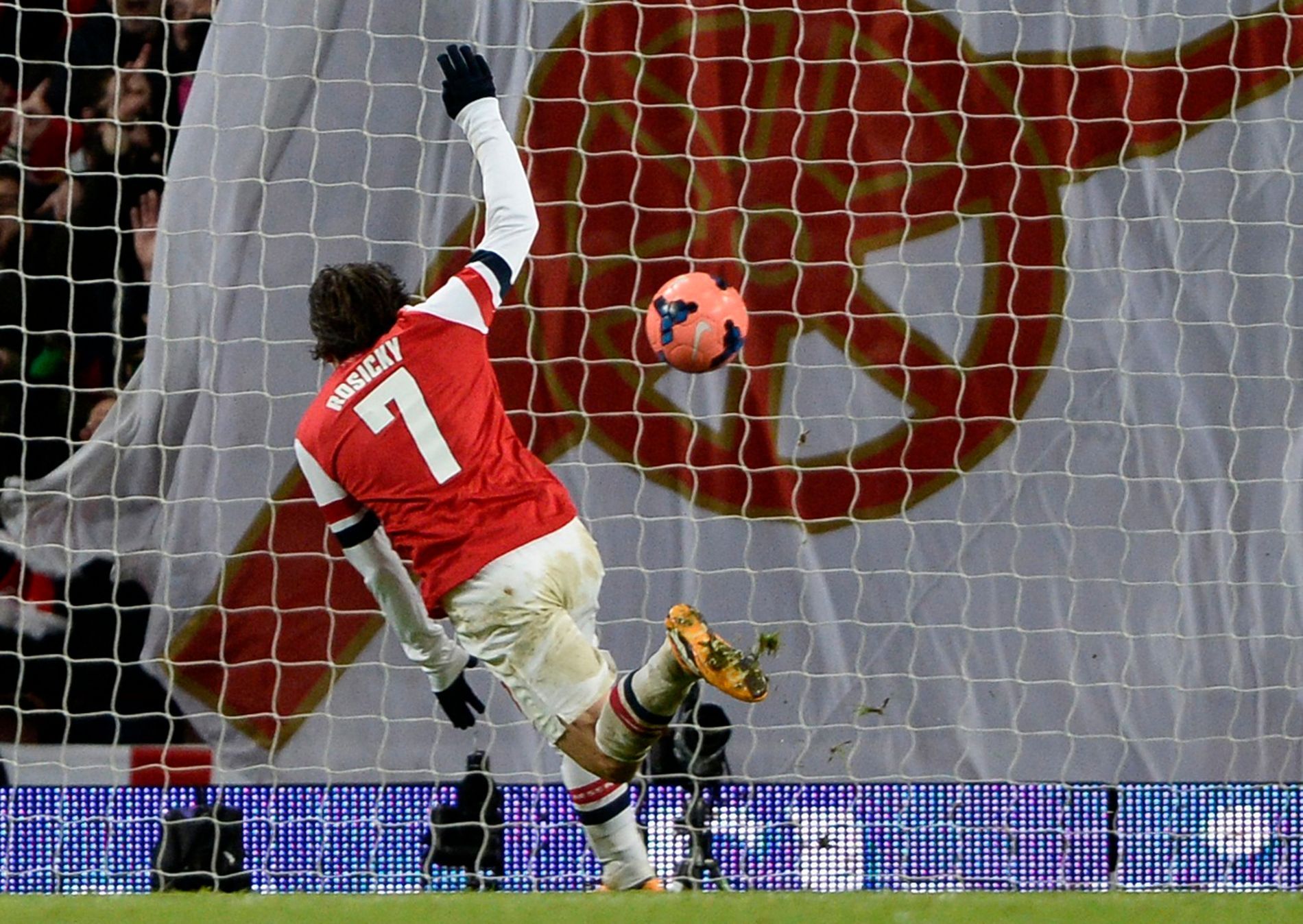 Arsenal's Rosicky scores a goal against Tottenham Hotspur during their English FA Cup soccer match at the Emirates stadium in London
