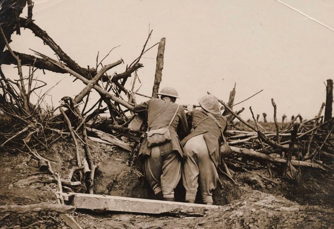 British officers observe artillery fire during the battle of the Somme in this 1916 handout picture.