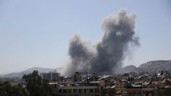 Smoke rises after strikes on Syria's defense ministry in Damascus