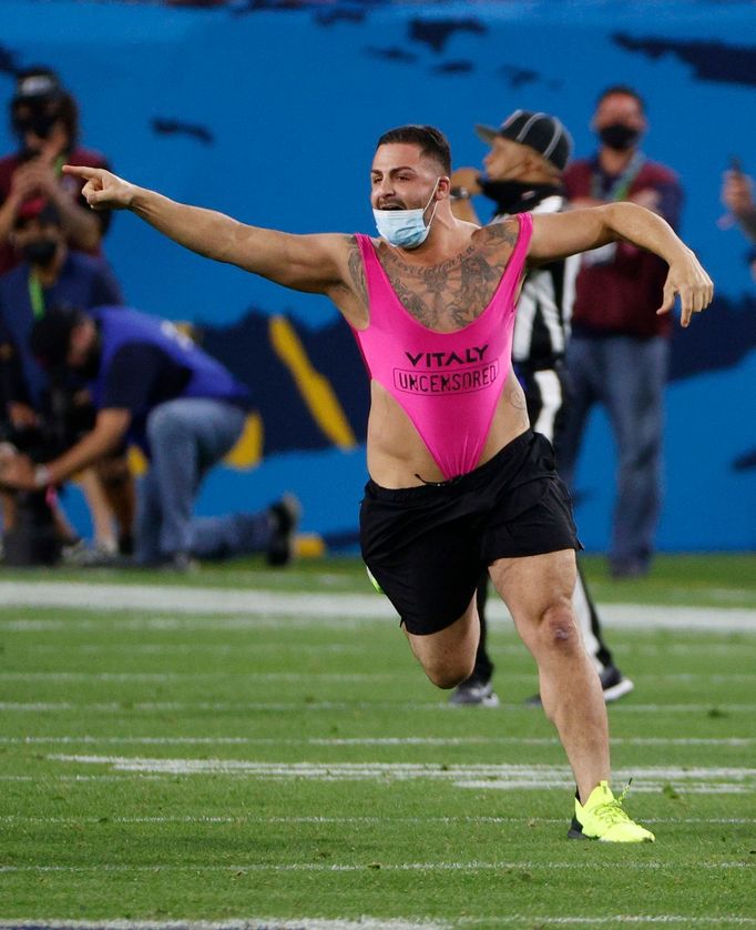 NFL Football - Super Bowl LV - Tampa Bay Buccaneers v Kansas City Chiefs - Raymond James Stadium, Tampa, Florida, U.S. - February 7, 2021 A man wears a protective face ma