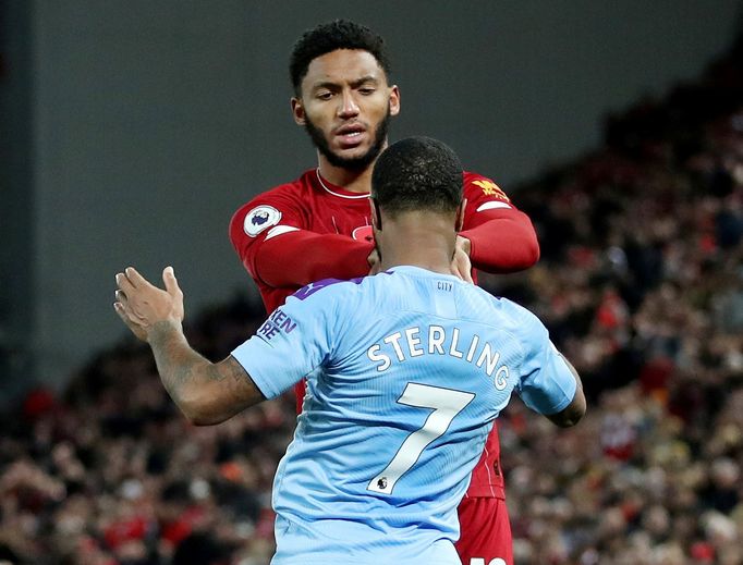 FILE PHOTO: Soccer Football - Premier League - Liverpool v Manchester City - Anfield, Liverpool, Britain - November 10, 2019  Liverpool's Joe Gomez and Manchester City's