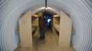 Paul Seyfried works in a bunker he is constructing for a client at Utah Shelter Systems in North Salt Lake, Utah, December 12, 2012. The price of the shelters range from $51,800 to $64,900. While most "preppers" discount the Mayan calendar prophecy, many are preparing to be self-sufficient for threats like nuclear war, natural disaster, famine and economic collapse. Picture taken December 12, 2012. REUTERS/Jim Urquhart (UNITED STATES - Tags: SOCIETY BUSINESS CONSTRUCTION) Published: Pro. 18, 2012, 5:24 odp.