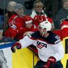 Hayes of the U.S. blocks Denisov of Belarus during the first period of their men's ice hockey World Championship Group B game at Minsk Arena in Minsk