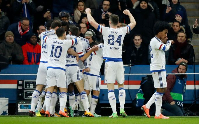 John Obi Mikel celebrates with team mates after scoring the first goal for Chelsea