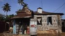 Shop attached to traditional colonial-era Board House stands open in Congo Town of Sierra Leone's capital Freetown