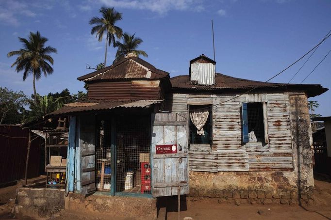 Shop attached to traditional colonial-era Board House stands open in Congo Town of Sierra Leone's capital Freetown