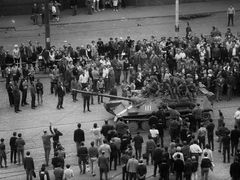Inhabitants of Brno surrounding a Russian tank