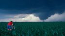 Storm Chaser Documenting Storm Professional storm chaser Katherine Bay documents a tornado in Turner County, South Dakota during an outbreak of twisters on June 24, 2003.