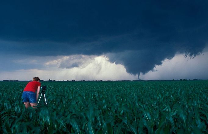 Storm Chaser Documenting Storm Professional storm chaser Katherine Bay documents a tornado in Turner County, South Dakota during an outbreak of twisters on June 24, 2003.