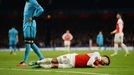 Arsenal's Alex Oxlade-Chamberlain lies injured