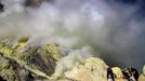 Sulfur miners risk health on Mount Ijen Jakarta, Indonesia. 24th October 2012 -- Sulfur mine with ladders, and gasses being released on Mt. Kawah Ijen. -- On Mount Ijen i