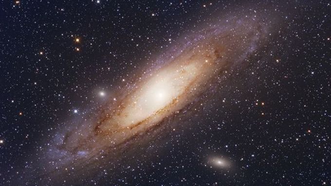 Galaxie M 31, která se chystá spojit s Mléčnou dráhou. Za pár miliard let.