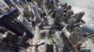 The 9/11 Memorial can be seen from the 90th story of One World Trade Center in New York, April 30, 2012. The addition of iron columns to the 100th story pushed the height of One World Trade above that of the Empire State Building today. REUTERS/Lucas Jackson (UNITED STATES - Tags: CITYSPACE SOCIETY) Published: Kvě. 1, 2012, 1:16 dop.