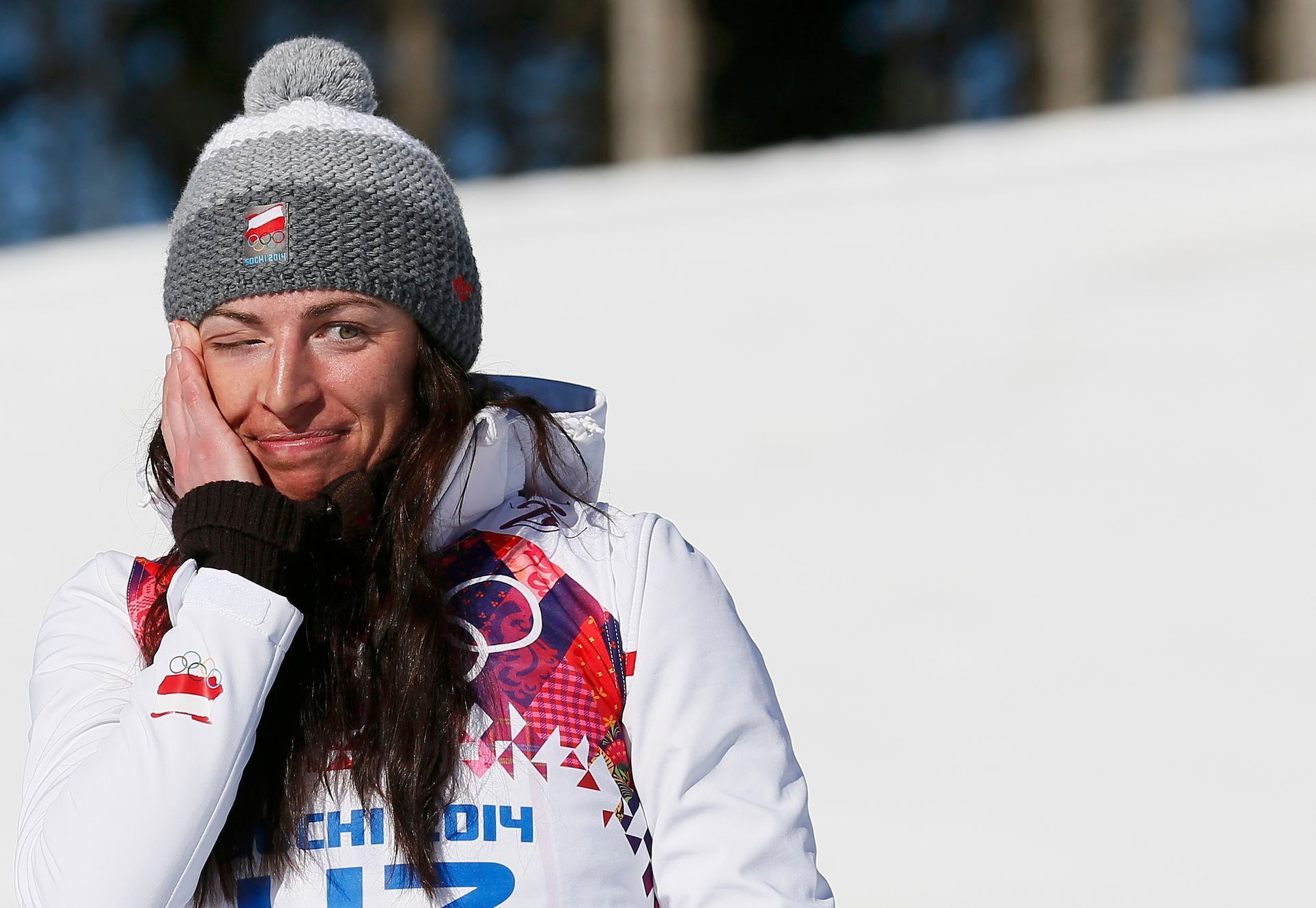Justyna Kowalczyková se raduje ze zlaté olympijské medaile