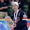 Hendricks of the U.S.holds the third place trophy after their Ice Hockey World Championship third-place game against the Czech Republic at the O2 arena in Prague