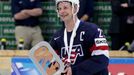 Matt Hendricks of the U.S.holds the third place trophy after their Ice Hockey World Championship third-place game against the Czech Republic at the O2 arena in Prague, Cz