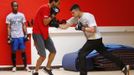 Unemployed Belgian Mohamed Sammar (R) takes part in a "Fit for a job" boxing class in Brussels July 1, 2013. Sammar, 27, has been looking for a job in the construction sector for 2 years. "Fit for a job" is the initiative of former Belgian boxing champion Bea Diallo, whose goal was to restore the confidence of unemployed people and help them find a job through their participation in sports. Picture taken July 1, 2013. REUTERS/Francois Lenoir (BELGIUM - Tags: SPORT BOXING SOCIETY BUSINESS EMPLOYMENT) Published: Čec. 5, 2013, 4:32 odp.