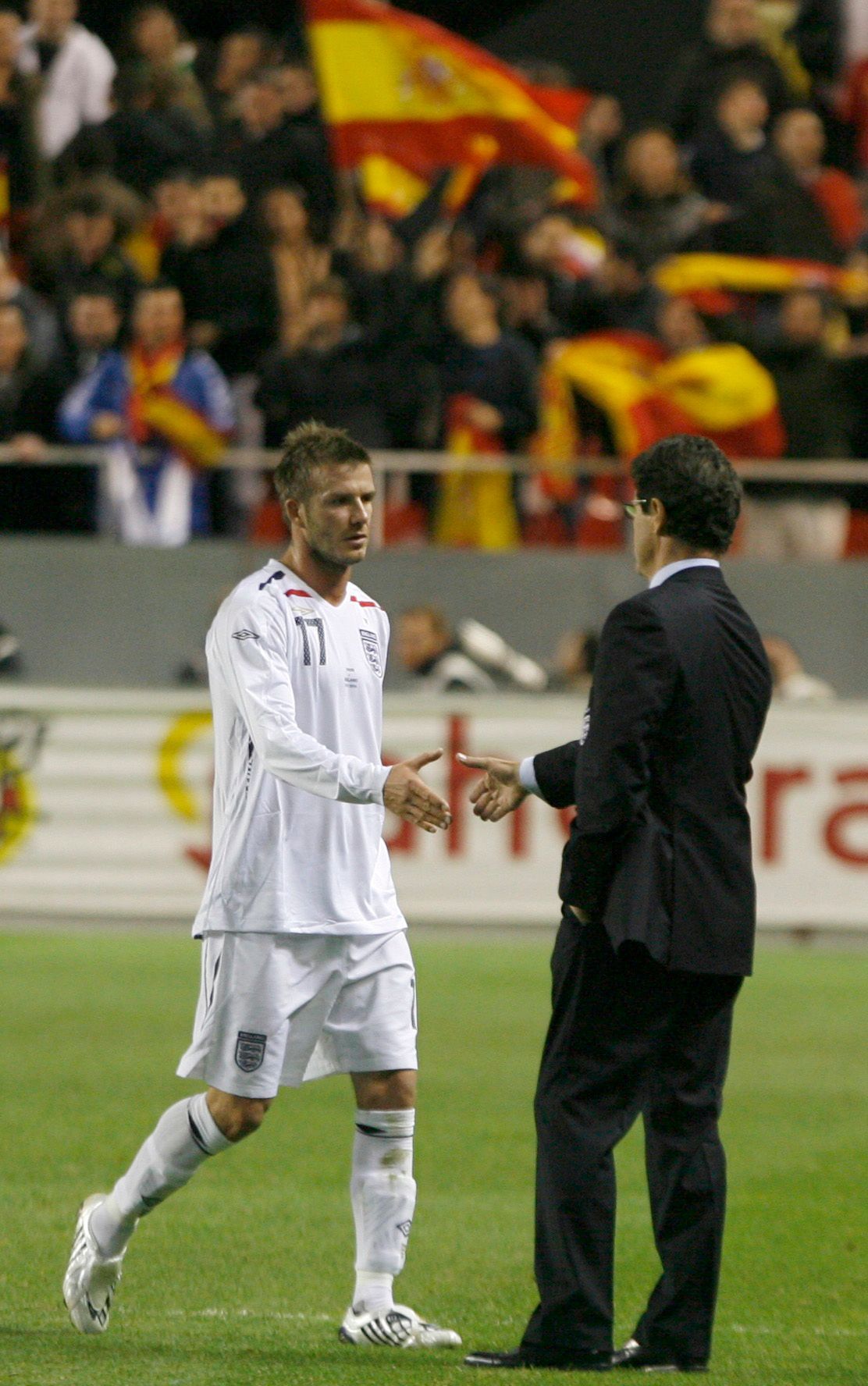 Anglie: David Beckham a Fabio Capello