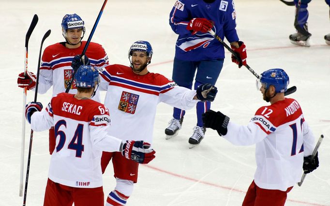 Jiri Sekac of the Czech Republic (L) celebrates his goal against France with team mates during the second period of their men's ice hockey World Championship Group A game