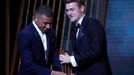 Soccer Football - The Ballon d’Or awards - Theatre du Chatelet, Paris, France - December 2, 2019   Paris St Germain's Kylian Mbappe with the Kopa trophy winner Juventus'