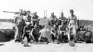 The crew of Patrol Torpedo boat PT-109, including U.S. Navy Lt. John F. Kennedy (R), are seen off Guadalcanal, in this handout image taken in July 1943.