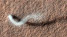 Mars’ Whirling Dust Devil A Martian dust devil roughly 12 miles (20 kilometers) high was captured winding its way along the Amazonis Planitia region of Northern Mars on March 14, 2012 by the High Resolution Imaging Science Experiment (HiRISE) camera on NASA's Mars Reconnaissance Orbiter. Despite its height, the plume is little more than three-quarters of a football field wide (70 yards, or 70 meters). HiRISE is operated by the University of Arizona, Tucson. The instrument was built by Ball Aerospace & Technologies Corp., Boulder, Colo. The Mars Reconnaissance Orbiter Project and the Mars Exploration Rover Project are managed by the Jet Propulsion Laboratory, Pasadena, Calif., for NASA's Science Mission Directorate, Washington. JPL is a division of the California Institute of Technology, also in Pasadena. Lockheed Martin Space Systems, Denver, built the orbiter. For more about the Mars Reconnaissance Orbiter, see: http://www.nasa.gov/mro Image credit: NASA/JPL-Caltech/UA