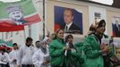 Members of a youth club supporting former Chechen leader Akhmad Kadyrov (printed on flag) march along a street during a rally in the centre of the Chechen capital Grozny April 25, 2013. The naming of two Chechens, Dzhokhar and Tamerlan Tsarnaev, as suspects in the Boston Marathon bombings has put Chechnya - the former site of a bloody separatist insurgency - back on the world's front pages. Moscow has poured billions of roubles into rebuilding Chechnya, a mainly Muslim province that has seen centuries of war and repression. Picture taken April 25, 2013. REUTERS/Maxim Shemetov (RUSSIA - Tags: SOCIETY POLITICS RELIGION) ATTENTION EDITORS: PICTURE 12 OF 40 FOR PACKAGE 'INSIDE MODERN CHECHNYA'. SEARCH 'REBUILDING CHECHNYA' FOR ALL IMAGES Published: Kvě. 1, 2013, 7:42 dop.