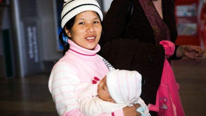 One of the new arrivals dressed in warm clothes to face the 30 degree temperature drop betwen Prague and Kuala Lumpur
