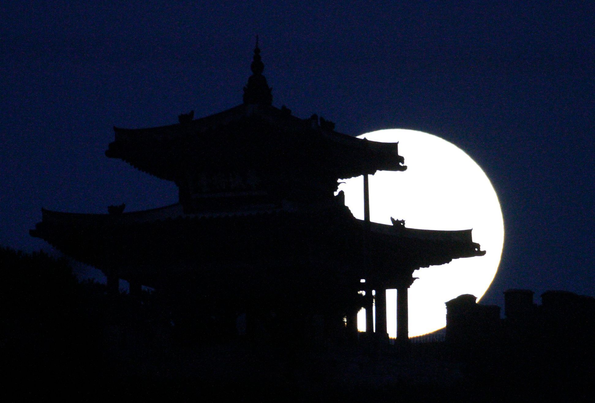 Supermoon rises behind Hwaseong Fortress in Suwon