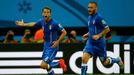 Italy's Claudio Marchisio and Itlay's Daniele De Rossi (R) celebrate Marchisio's goal against England during their 2014 World Cup Group D soccer match at the Amazonia are