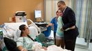 July 22, 2012 "The President hugs Stephanie Davies, who helped keep her friend, Allie Young, left, stay alive after she was shot during the movie theater shootings in Aurora, Colo. The President visited patients and family members affected by the shootings at the University of Colorado Hospital. The President later told their story in a news conference."