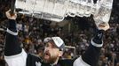 Los Angeles Kings' Justin Williams celebrates with the Stanley Cup after the Kings defeated the New York Rangers in Game 5 of their NHL Stanley Cup Finals hockey series i