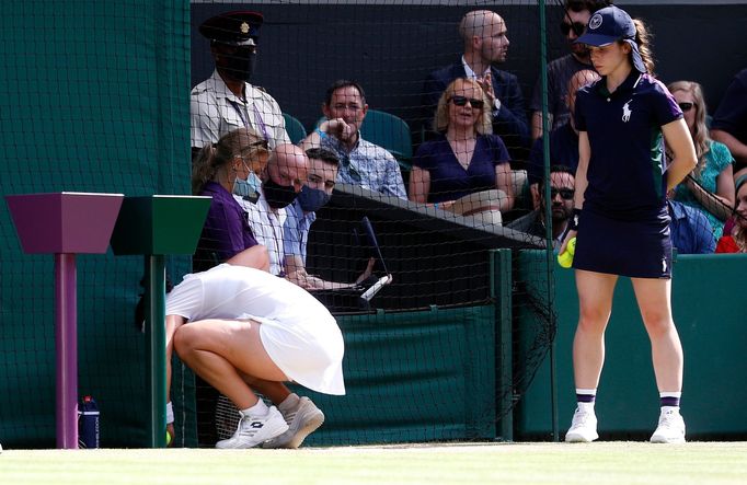 Tennis - Wimbledon - All England Lawn Tennis and Croquet Club, London, Britain - July 2, 2021 Tunisia's Ons Jabeur retrieving the ball  during her third round match again