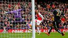 Theo Walcott scores the first goal for Arsenal