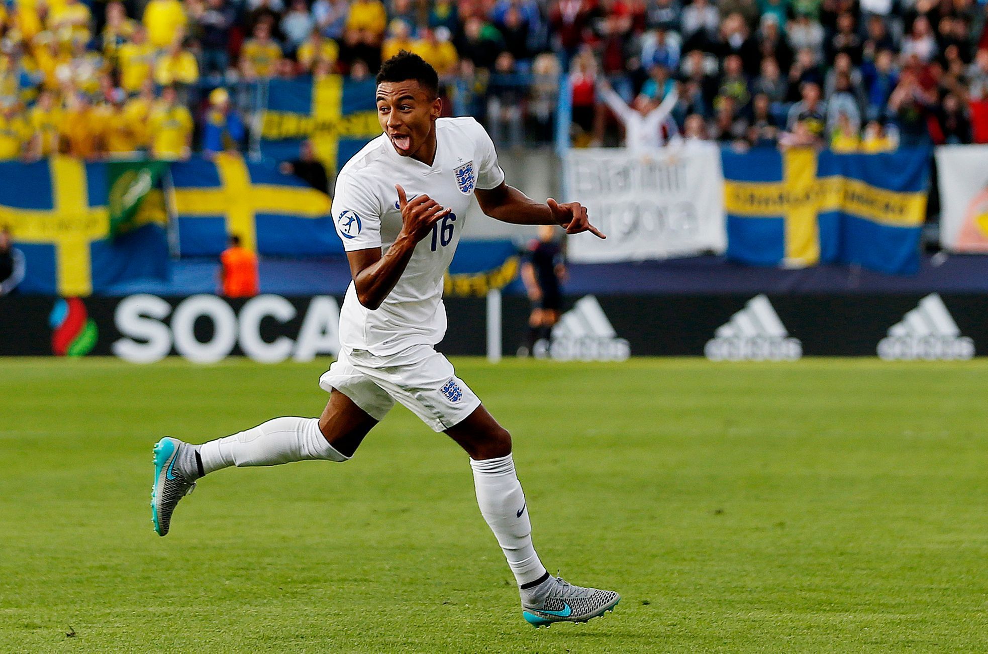 SOC: Jesse Lingard celebrates after scoring the first goal for England